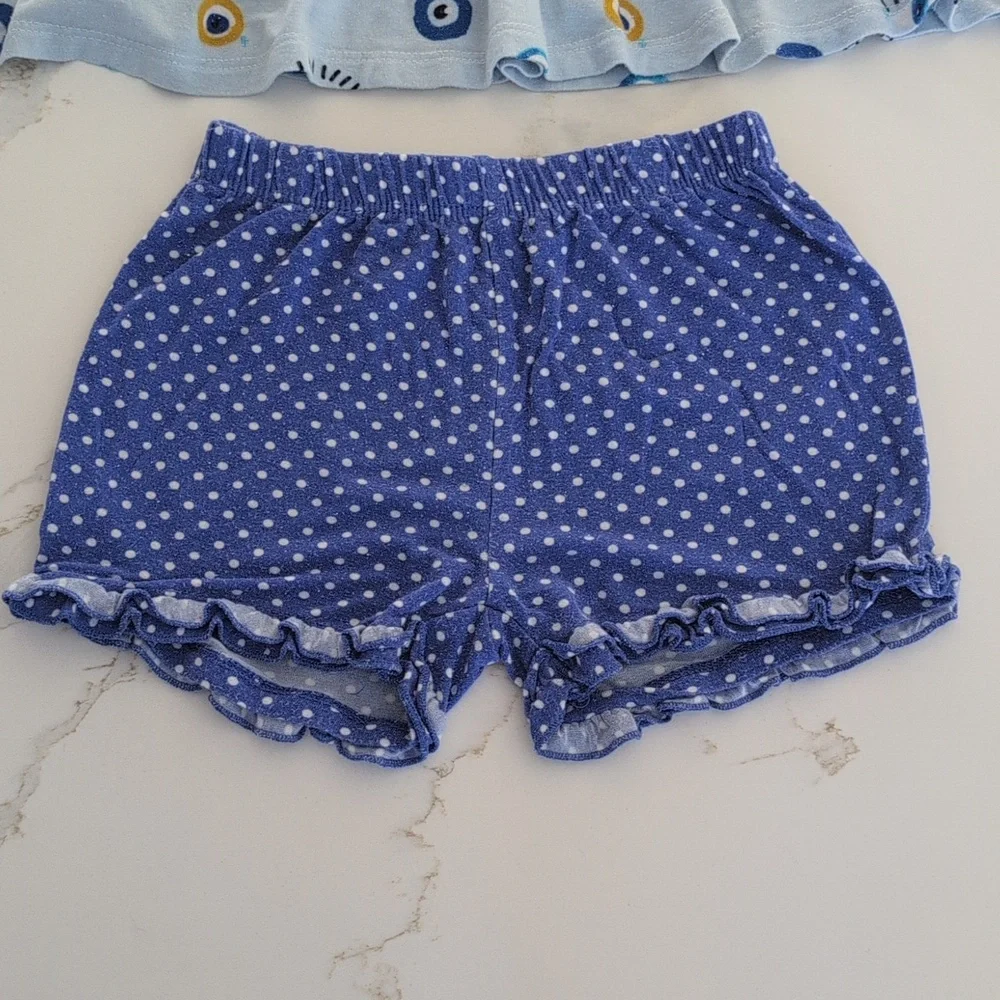 Posh Peanut Light Blue Eye-Print Peplum Top with Navy Dot Shorts